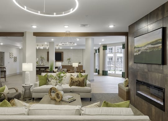 Clubhouse with seating and fireplace; flat screen TV