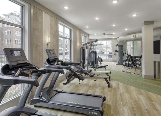 Fitness center with cardio and resistance training equipment; free weights
