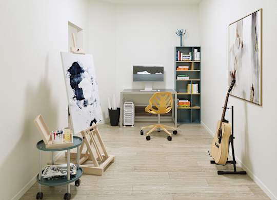 A room with a white wall and a painting on the easel.