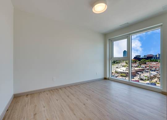 Empty room with a view of the city.