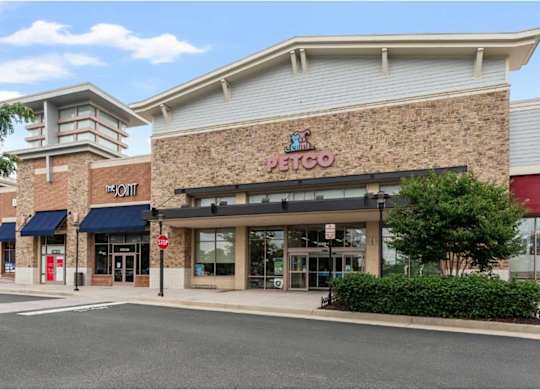 Exterior of petco building in a strip mall.