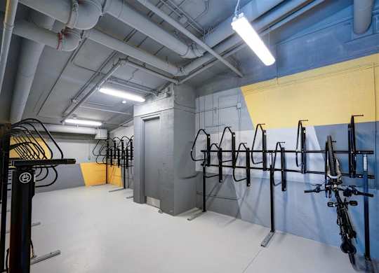 a gym with a lot of exercise equipment in a room