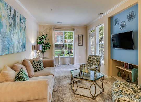 a living room with a couch and a television