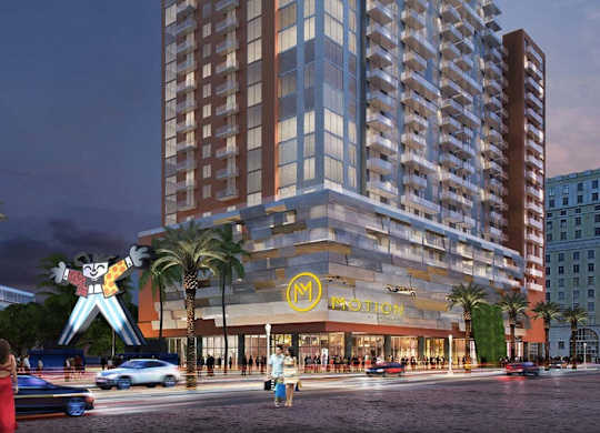 a rendering of a building with a statue on the street