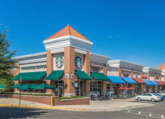 a building with a clock on the front of it