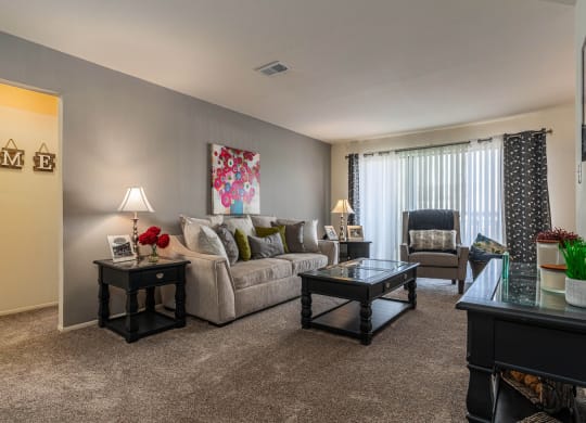 Large Living Room space at Knottingham Apartments in Clinton Township, MI