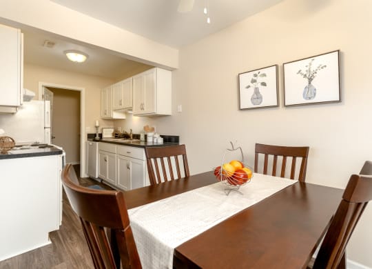 Dining Room and Kitchen  at Three Oaks Apartments, Troy