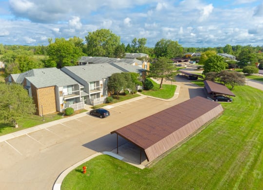 Three Oaks Apartments Exterior and Carport at Three Oaks Apartments, Troy, MI