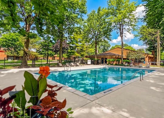 Heated pool with sundeck at Eastwood Village Apartments in Clinton Township, MI.