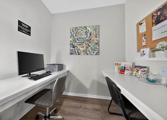 Clubhouse with coworking lounge at Eastwood Village Apartments in Clinton Township, MI.