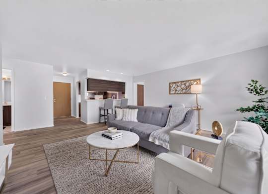 Spacious living room at Franklin River Apartments in Southfield, MI.