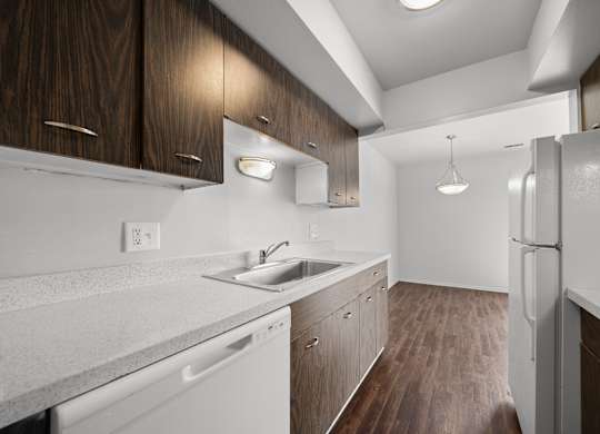 Modern and spacious kitchen at Knottingham Apartments in Clinton Township, MI.