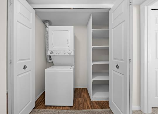 Spacious In-unit Laundry and Linen Closet at Lakeside Village Apartments Clinton Township MI