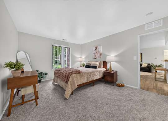 Spacious bedroom with ample storage at Park Lane Apartments in Southfield, MI.