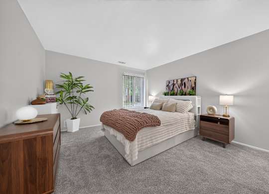 Cozy bedroom with ample storage at Park Lane Apartments in Southfield, MI.