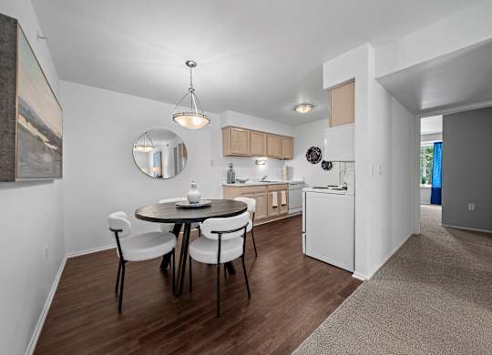 Large kitchen and dining room at Prentiss Pointe Apartments in Harrison Township, MI