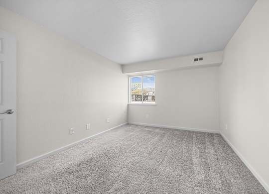 Large bedroom at Three Oaks Apartments in Troy, MI