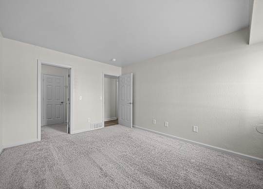 Large bedroom at Three Oaks Apartments in Troy, MI