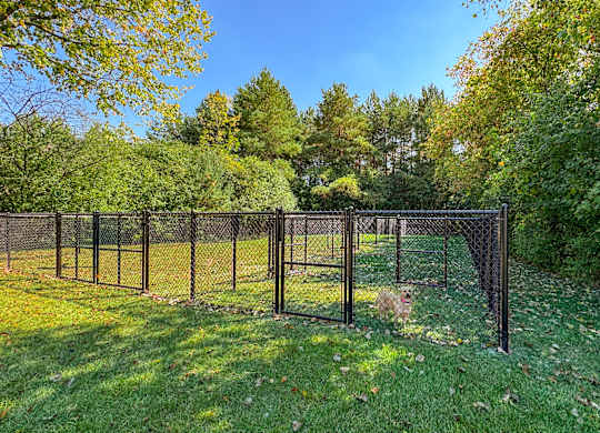 Spacious fenced-in Dog Park at Three Oaks Apartments in Troy, MI