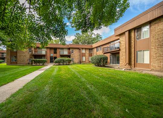 Cozy building exterior at Westwood Village Apartments in Westland, MI.