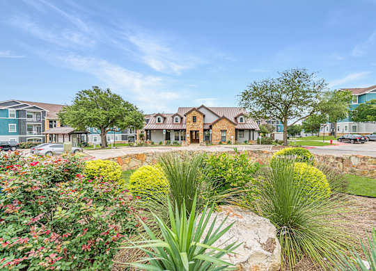 A residential area with houses and greenery.