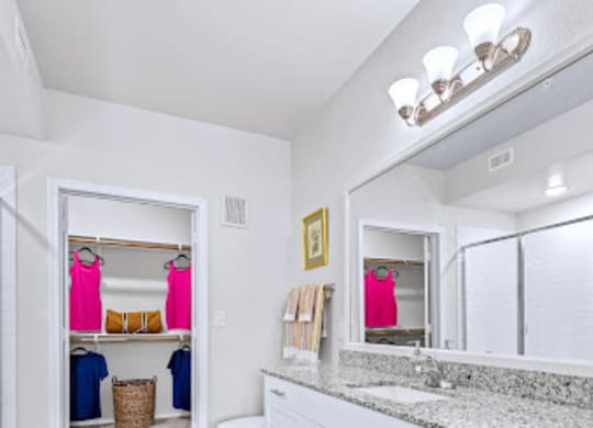 Bathroom With Vanity Lights at Mariposa at Harris Road Arlington 55+ Apartments, Arlington