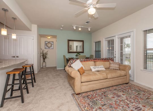 Living And Kitchen at Mariposa at Clear Creek Webster 55+ Apartments, Webster, 77598