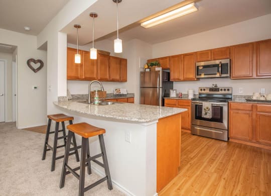 Gourmet Kitchen at Mariposa at Clear Creek Webster 55+ Apartments, Webster, TX