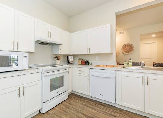 White Appliances at Hazelwood Place Apartments, Princeton, TX 75407