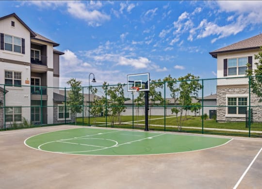the basketball court at the estates apartments at Cypress Creek at River Oaks, Texas, 75165