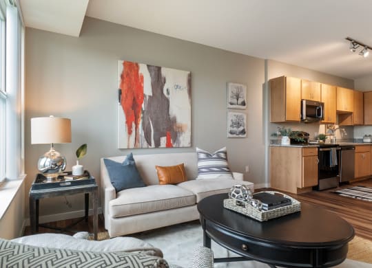 Model Apt Living Room & Kitchen at Orville Commons, Woodbury, MN 55129