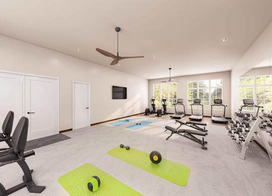 A spacious home gym with a variety of exercise equipment at Sage at Franklin Park Apartment , Austin, Texas