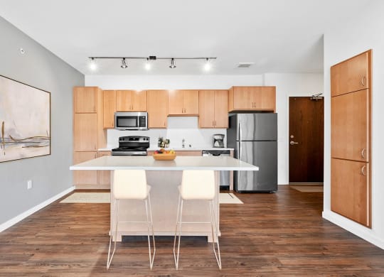 Kitchen area with dining at 1500 Nicollet Apartment Homes, Minnesota