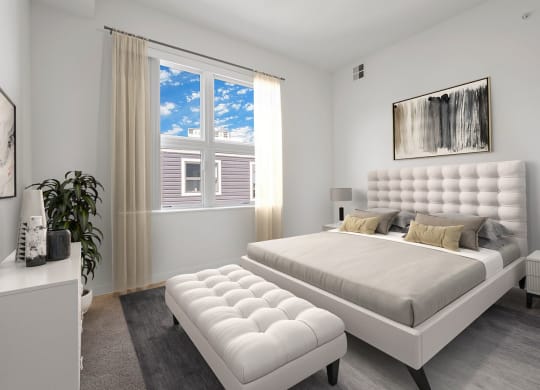 Bedroom with cozy bed at 1500 Nicollet Apartment Homes, Minneapolis, 55403