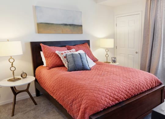 Red Bedroom With Window at The Bluffs at Liberty Glen, St. Cloud  