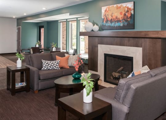 Clubroom With Fireplace at The Cavanagh 55+ Apartments, Minnesota, 55429