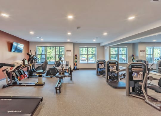 Fitness Center with equipment at Covington Crossings 55+ Senior Living, Georgia
