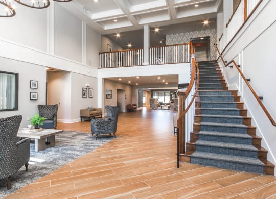 Lobby And Staircase at Haven at Congaree Pointe 55+ Apartments, Columbia, SC 29209