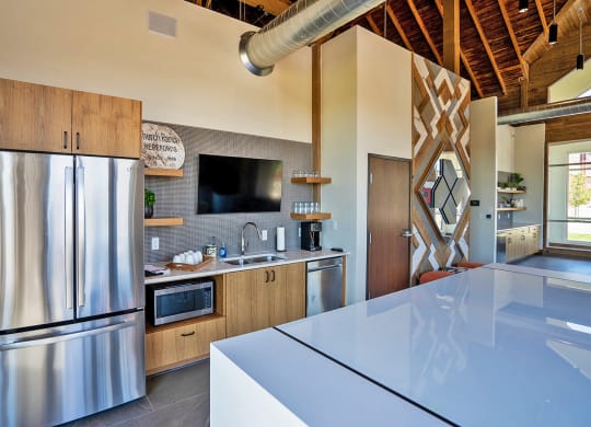 Kitchen with appliances at Heritage at Church Ranch 55+ Apartments, Westminster , Colorado