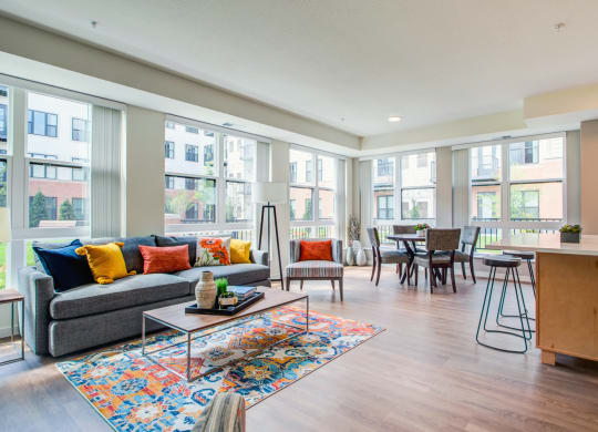Living Room With Oversized Windows And Doors at The Legends at Berry 62+ Apartments, Minnesota 55114