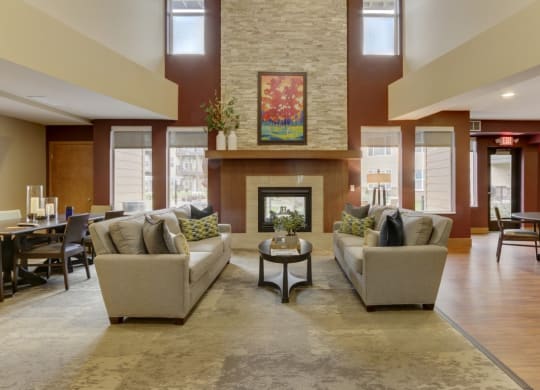 Community Room with sitting area at The Legends at Silver Lake Village 55+ Apartments, St. Anthony, Minnesota