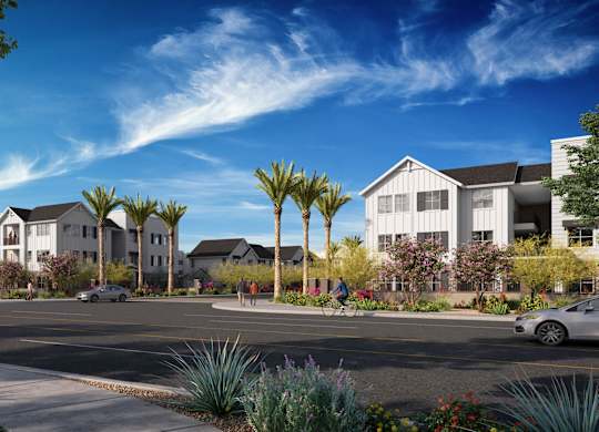 A street view of a residential area with houses and cars at Orchard Springs 55+ Apartment, Surprise, AZ, 85374