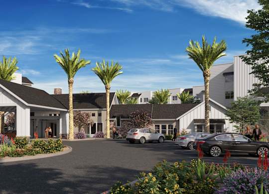 A modern building with a white exterior and a curved driveway in front at Orchard Springs 55+ Apartment , Arizona, 85374