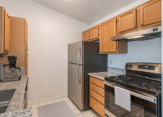 Virtually Staged Kitchen at Pinewood Apartments, Houston Texas