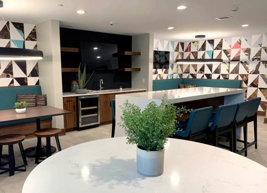 Community room area with couch at Preserve at Shady Oak Apartments, Minnetonka , MN 55343