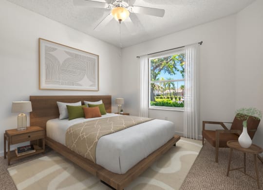 a bedroom with a large bed and a ceiling fan