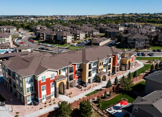 an aerial view of an apartment complex in a city