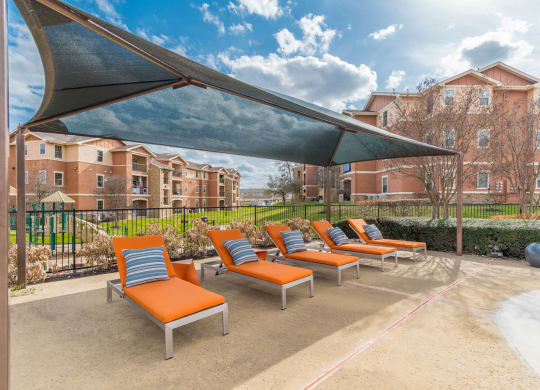 Poolside Chairs at Stoneridge Apartments, Pflugerville, TX 78660
