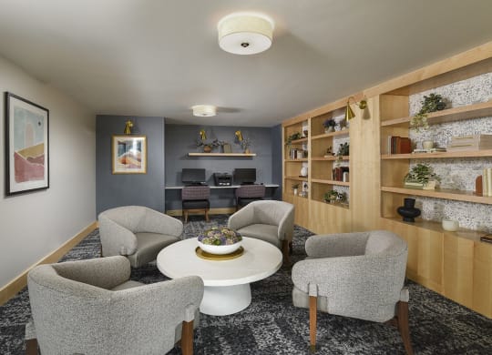 Room with coffee table and four chairs at Juniper Square 55+ Apartments, Arizona, 85301