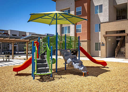 Play area for kids at Estrella Springs at Canyon Trails Apartments, Arizona
